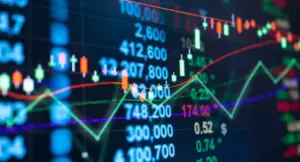 Grafico di borsa con candele e numeri che mostrano l'andamento dei titoli