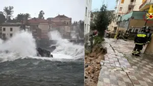 Onde violente si infrangono sulla costa e vigili del fuoco vicino a una strada crollata