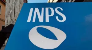 Insegna blu dell'INPS all'esterno di un edificio